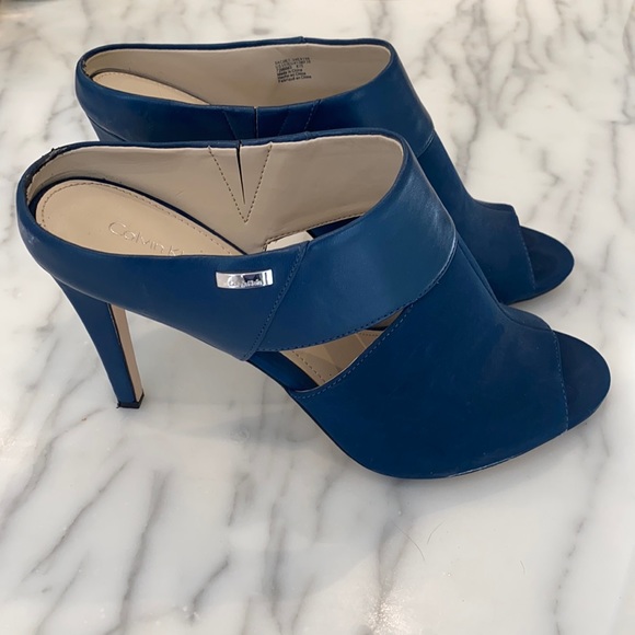 Calvin Klein Shoes - Calvin Klein Blue Sandals with Sleek Design